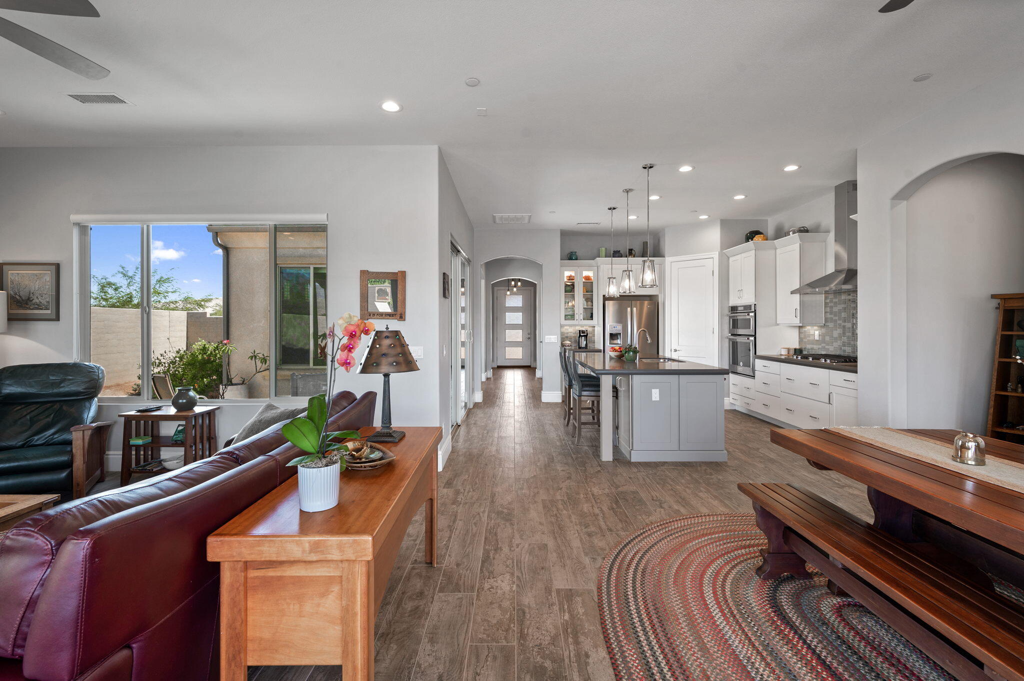 49 Cabernet Rancho Mirage, CA 92270 - Photo 10 of 40 a large kitchen with a table and chairs