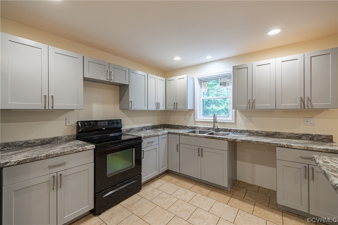 363 Oak Hill Road Prospect, VA 23960 - Photo 12 of 33 a kitchen with granite countertop cabinets stainless steel appliances and a sink
