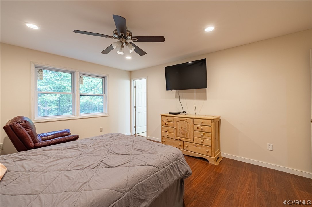 363 Oak Hill Road Prospect, VA 23960 - Photo 15 of 33 a bedroom with a bed and a flat screen tv