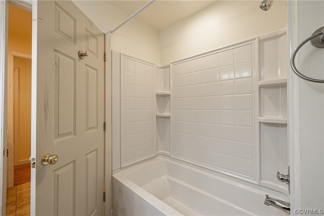 363 Oak Hill Road Prospect, VA 23960 - Photo 20 of 33 a bathroom with a bathtub and a shower