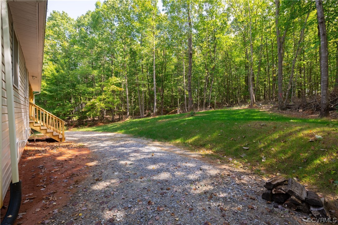 363 Oak Hill Road Prospect, VA 23960 - Photo 33 of 33 a view of a yard with plants and large trees