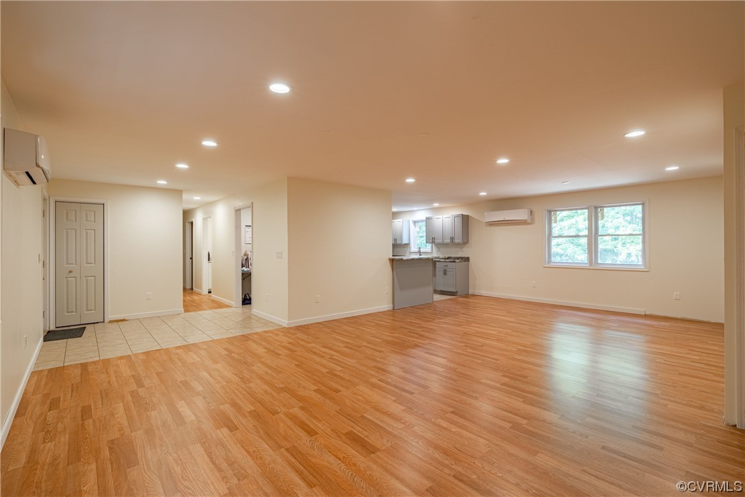 363 Oak Hill Road Prospect, VA 23960 - Photo 4 of 33 a view of empty room with wooden floor and windows