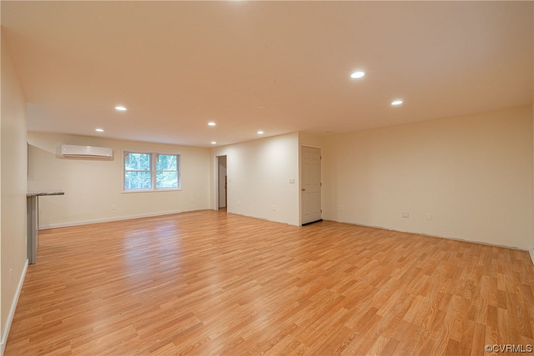 363 Oak Hill Road Prospect, VA 23960 - Photo 5 of 33 a view of an empty room with wooden floor and a window