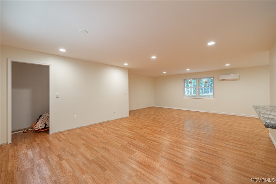 363 Oak Hill Road Prospect, VA 23960 - Photo 6 of 33 a view of an empty room with wooden floor and a window