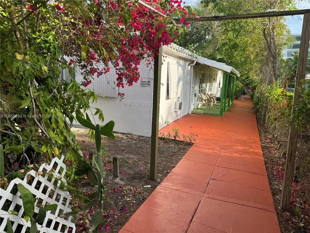 a backyard of a house with seating space