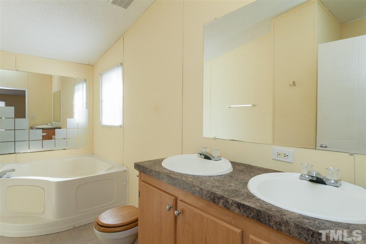 8810 South Creek Road Willow Spring, NC 27592 - Photo 14 of 23