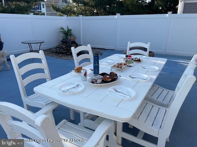 347 Highway 35 Mantoloking, NJ 08738 - Photo 2 of 9 Charming outdoor dining space awaits gatherings.