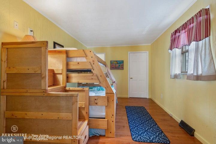 347 Highway 35 Mantoloking, NJ 08738 - Photo 5 of 9 Cozy bedroom with charming wooden bunk beds.