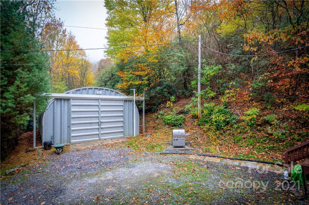 146 Spring Drive Maggie Valley, NC 28751 - Photo 21 of 36 a front view of a house with a yard