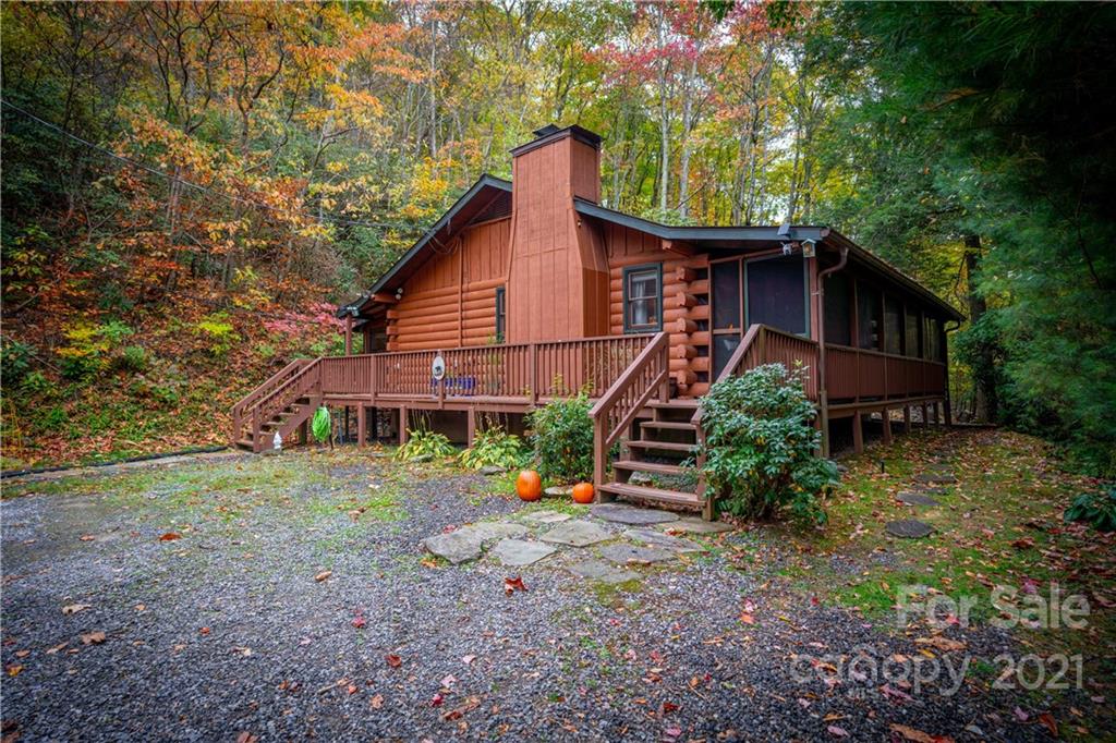146 Spring Drive Maggie Valley, NC 28751 - Photo 4 of 36 a view of a house with a yard