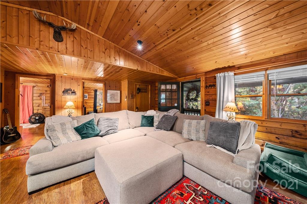 146 Spring Drive Maggie Valley, NC 28751 - Photo 5 of 36 a living room with furniture and a large window