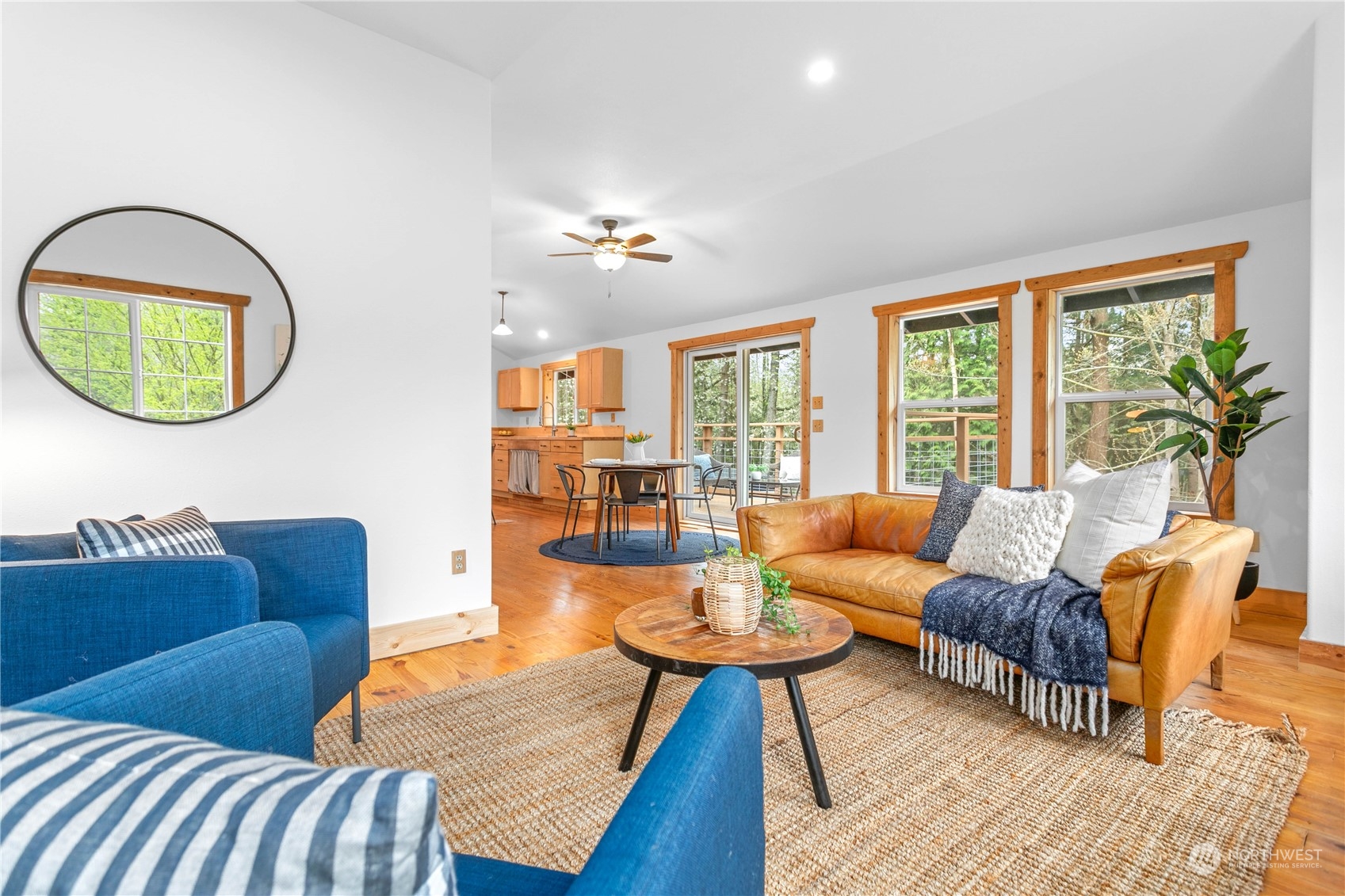 3900 Bay Road Ferndale, WA 98248 - Photo 12 of 40 a living room with furniture potted plant and a large window