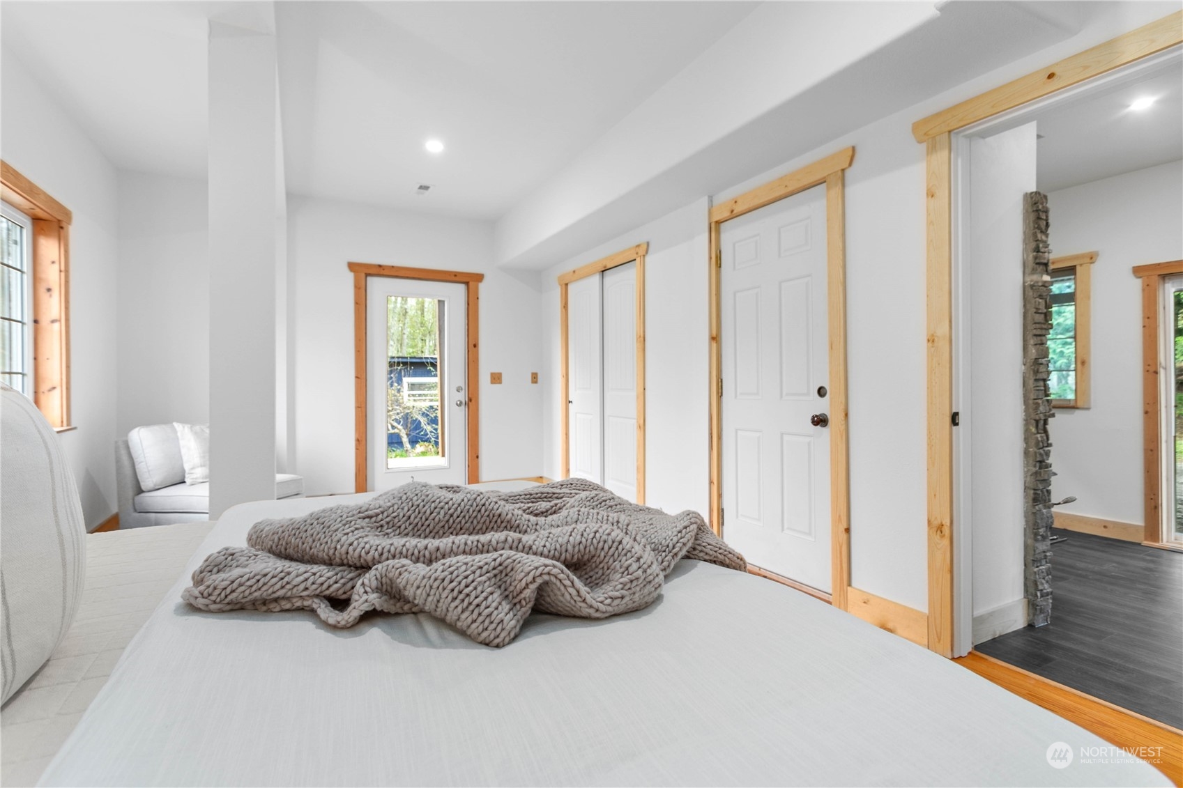 3900 Bay Road Ferndale, WA 98248 - Photo 26 of 40 a spacious bedroom with a bed and a couch