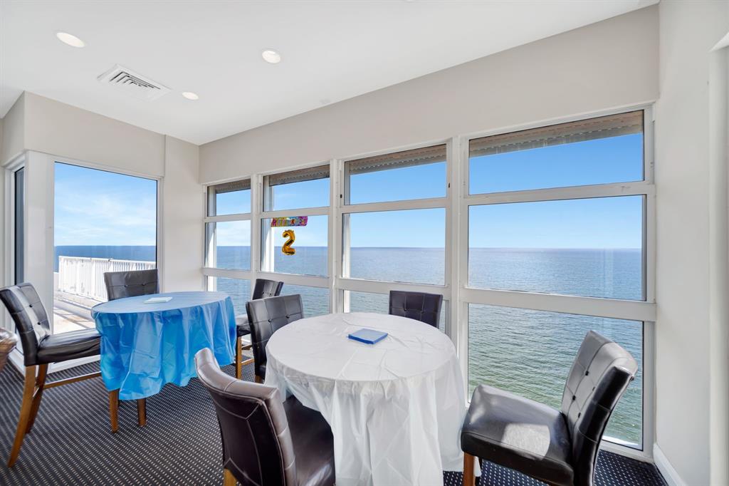 1360 South Ocean Boulevard, Unit 905 Pompano Beach, FL 33062 - Photo 20 of 57 a view of a dining room with furniture window and wooden floor