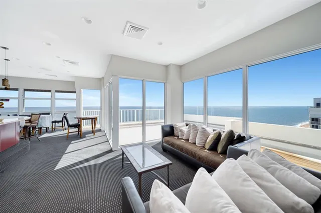 a bathroom with a granite countertop sink mirror and double
