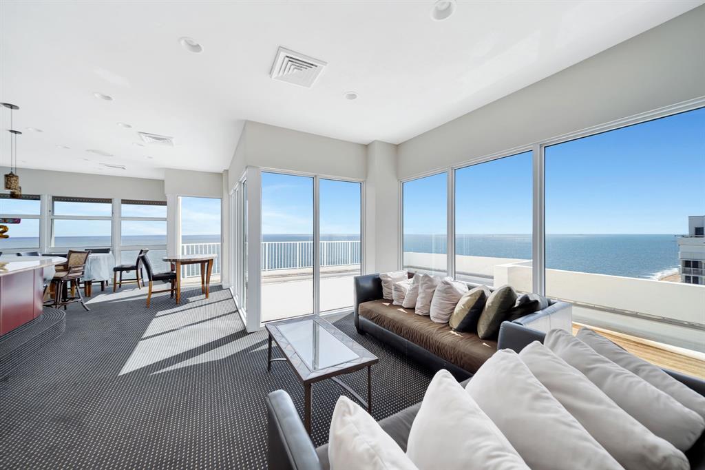 1360 South Ocean Boulevard, Unit 905 Pompano Beach, FL 33062 - Photo 21 of 57 a living room with furniture and a large window