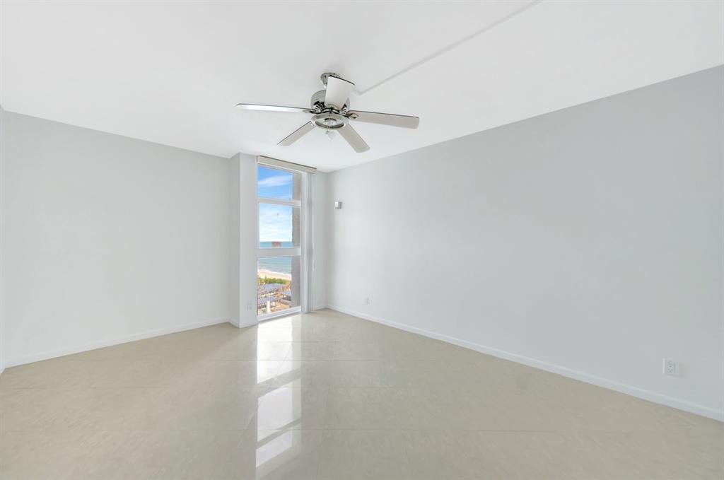 1360 South Ocean Boulevard, Unit 905 Pompano Beach, FL 33062 - Photo 29 of 57 a view of an empty room with a window