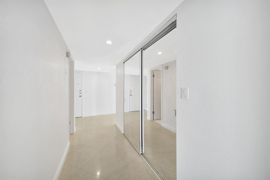 1360 South Ocean Boulevard, Unit 905 Pompano Beach, FL 33062 - Photo 31 of 57 a view of a hallway