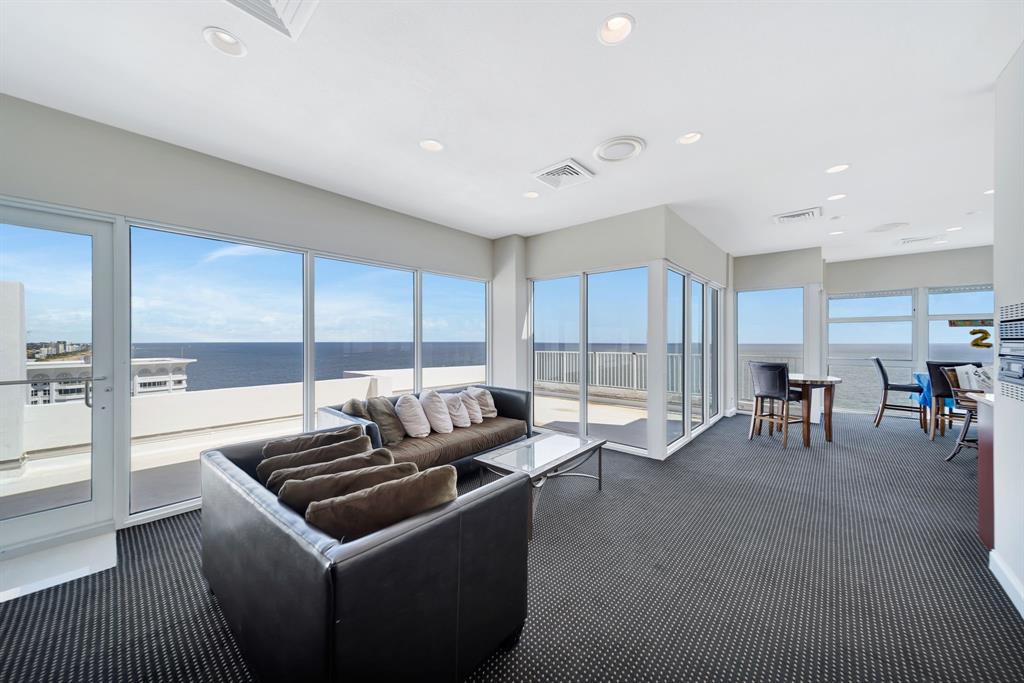 1360 South Ocean Boulevard, Unit 905 Pompano Beach, FL 33062 - Photo 42 of 57 a living room with furniture a table and chairs