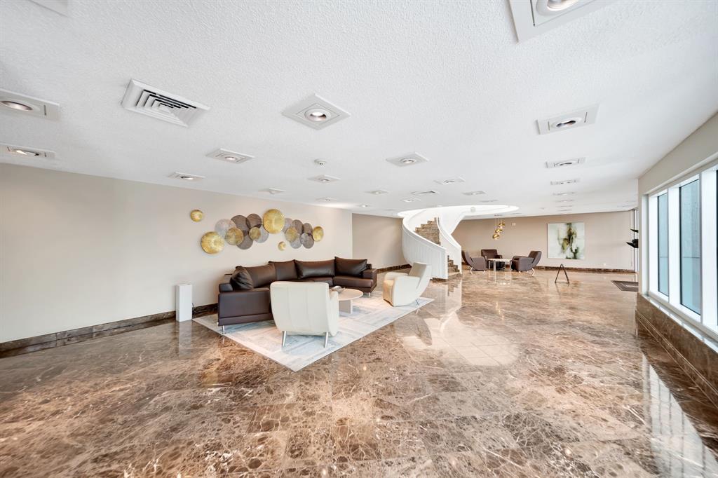 1360 South Ocean Boulevard, Unit 905 Pompano Beach, FL 33062 - Photo 48 of 57 a living room with furniture and a large window