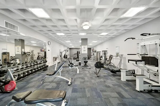 a room with a table and chairs