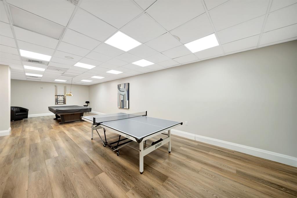 1360 South Ocean Boulevard, Unit 905 Pompano Beach, FL 33062 - Photo 52 of 57 a room with furniture and wooden floor