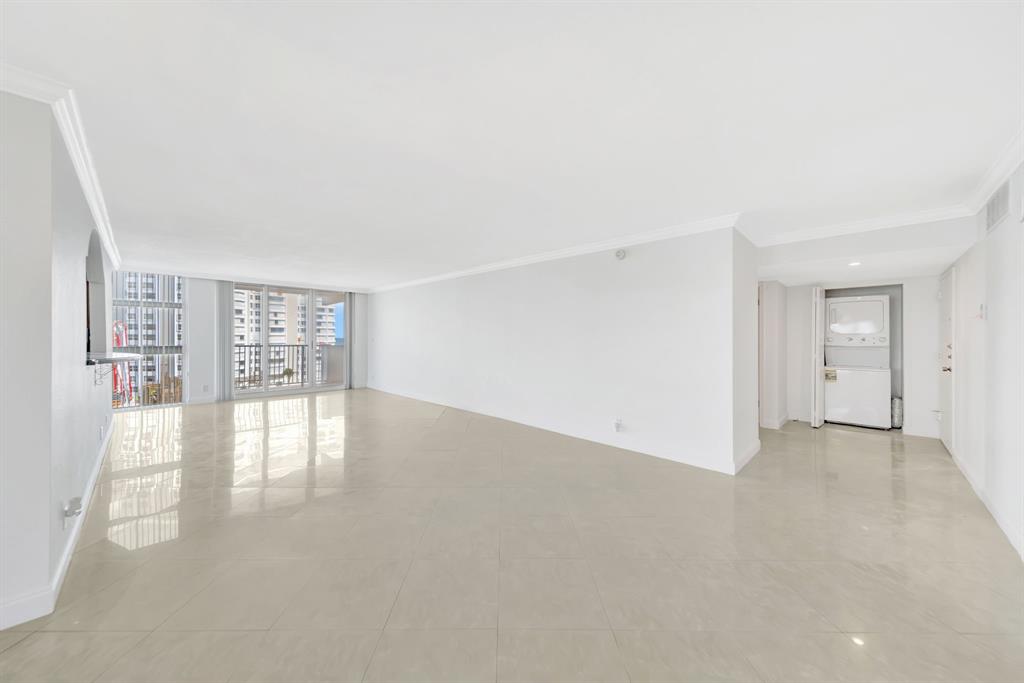 1360 South Ocean Boulevard, Unit 905 Pompano Beach, FL 33062 - Photo 6 of 57 a view of an empty room with a window