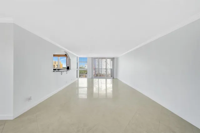 a view of a swimming pool with a terrace