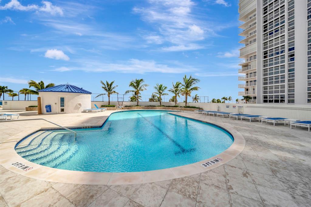 1360 South Ocean Boulevard, Unit 905 Pompano Beach, FL 33062 - Photo 9 of 57 a view of a swimming pool with a terrace