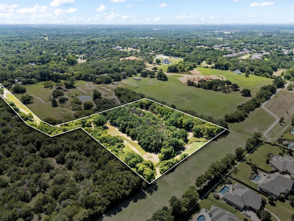 13109 Roanoke Road Westlake, TX 76262 - Photo 2 of 35 an aerial view of a residential houses covered in trees