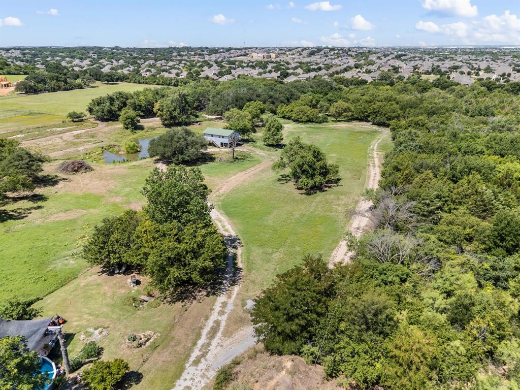13109 Roanoke Road Westlake, TX 76262 - Photo 3 of 35 a view of a lake with a mountain in the background