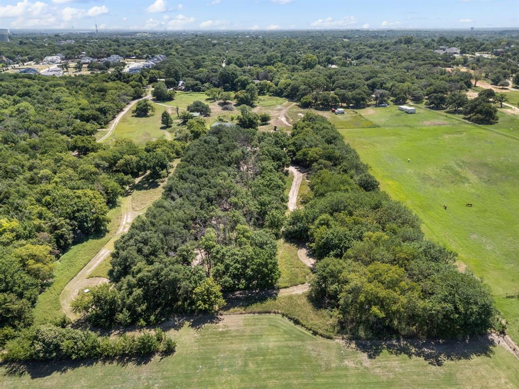 13109 Roanoke Road Westlake, TX 76262 - Photo 31 of 35 an aerial view of residential houses with outdoor space and trees