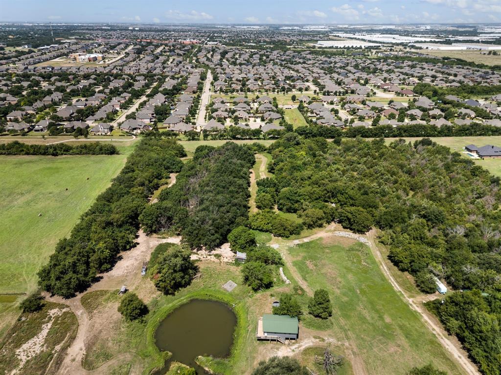 13109 Roanoke Road Westlake, TX 76262 - Photo 5 of 35 an aerial view of residential houses with outdoor space