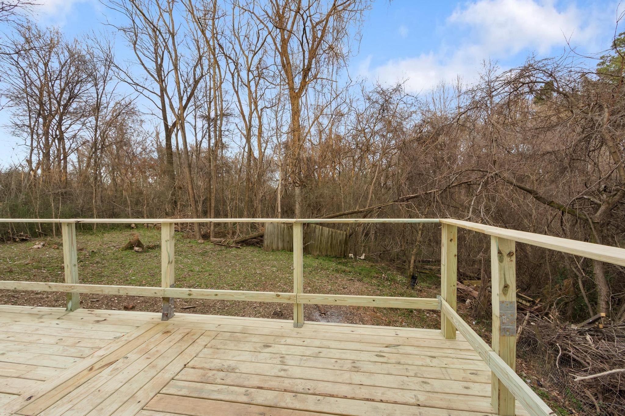 3726 Mart Road Memphis, TN 38109 - Photo 33 of 33 a view of balcony with wooden floor and fence