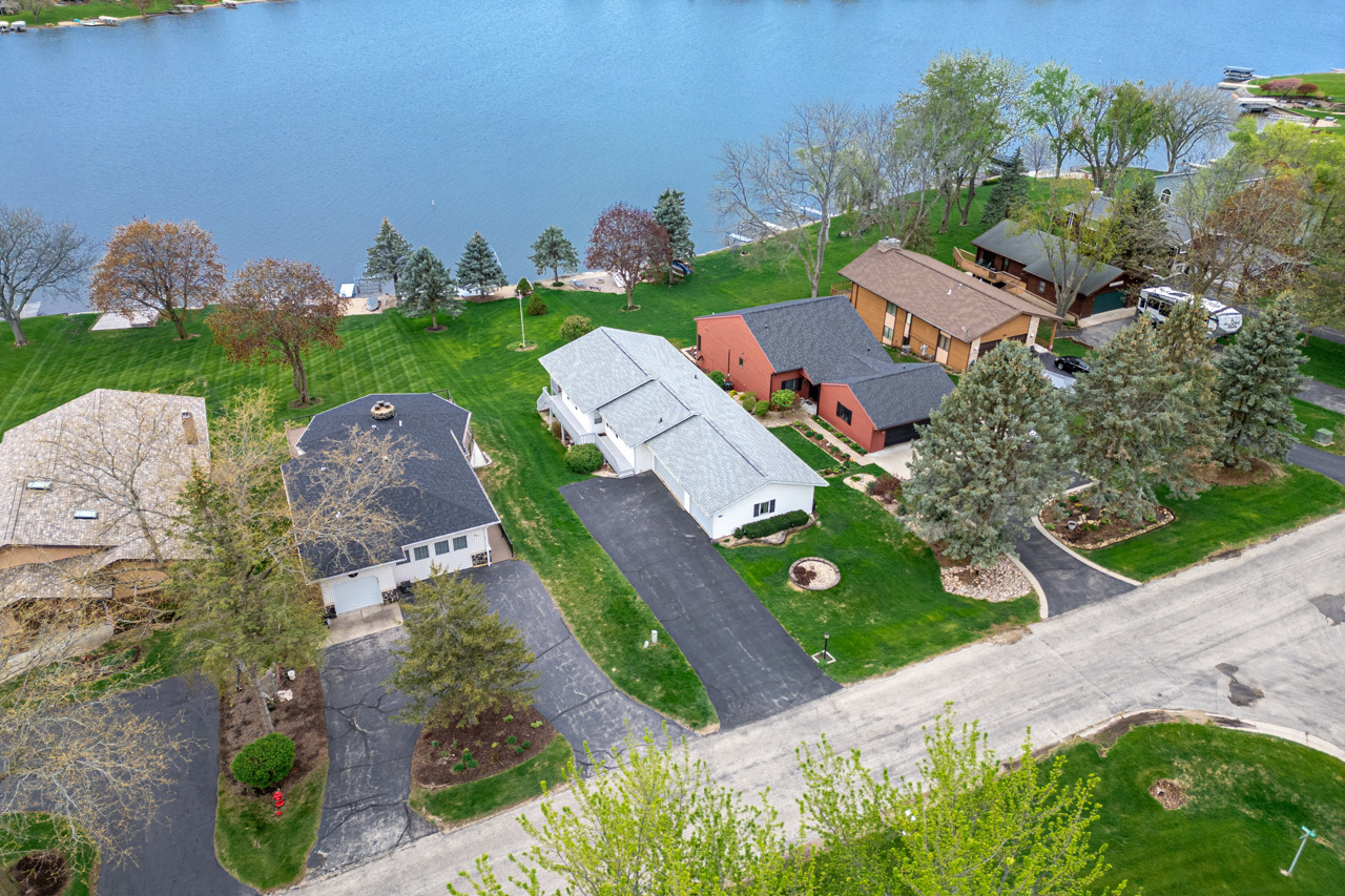 860 Breckenboro Road Davis, IL 61019 - Photo 3 of 26 an aerial view of a house with garden