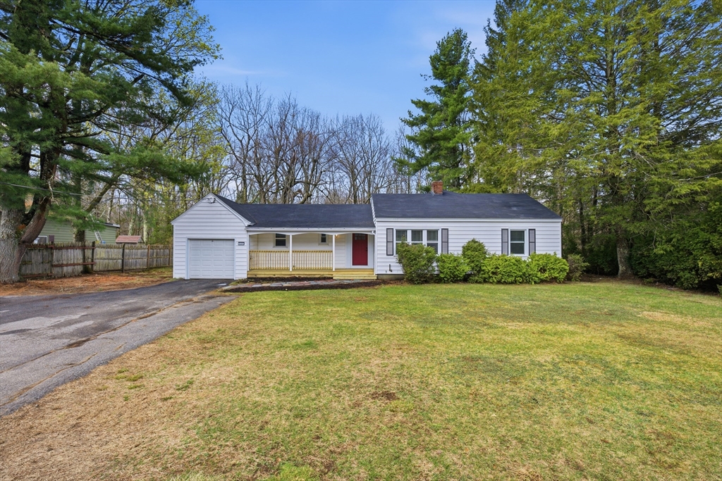 309 Pleasant Street Paxton, MA 01612 - Photo 2 of 27 a front view of a house with a garden