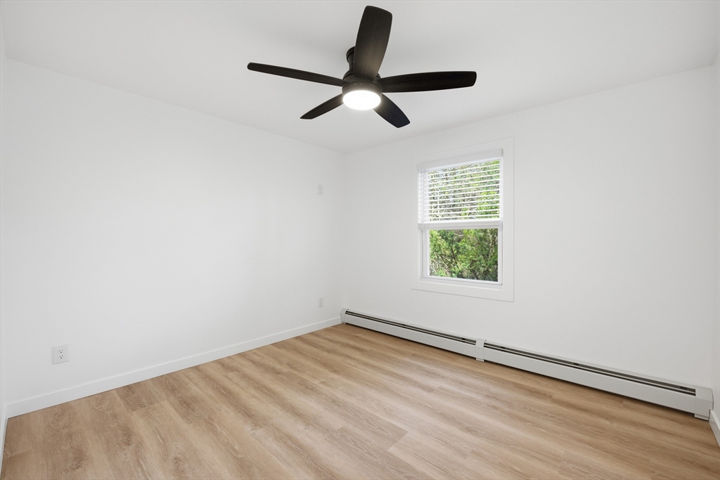309 Pleasant Street Paxton, MA 01612 - Photo 24 of 27 an empty room with a window
