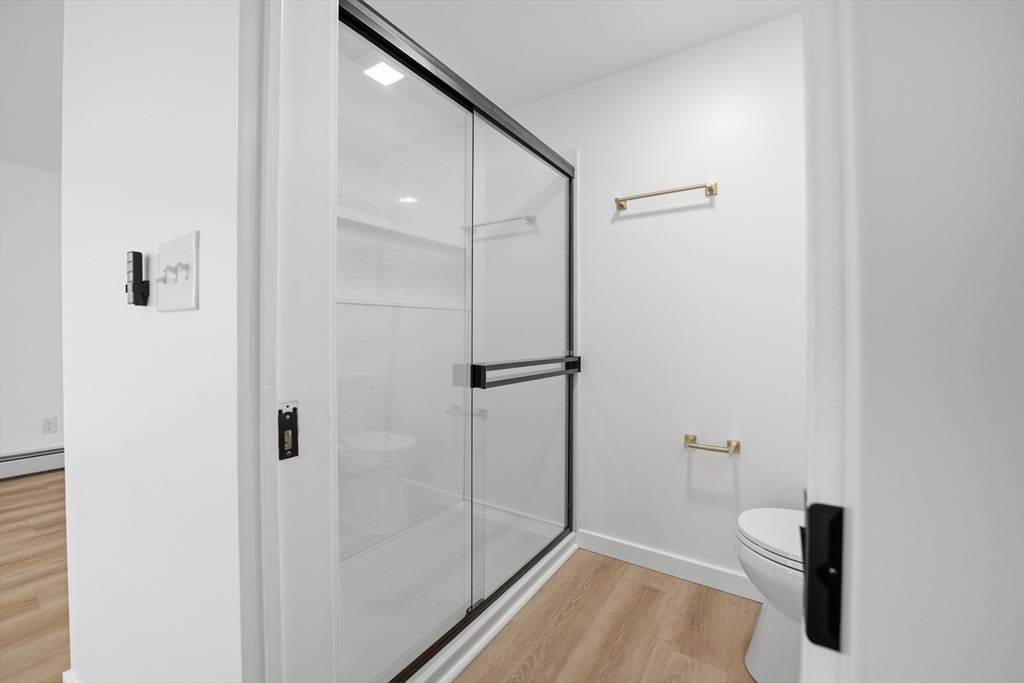 309 Pleasant Street Paxton, MA 01612 - Photo 26 of 27 a bathroom with a shower and toilet