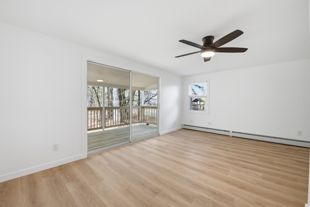 309 Pleasant Street Paxton, MA 01612 - Photo 8 of 27 a view of an empty room with a window