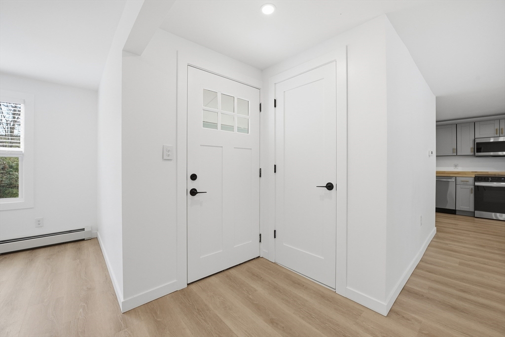 309 Pleasant Street Paxton, MA 01612 - Photo 9 of 27 a view of a livingroom with wooden floor
