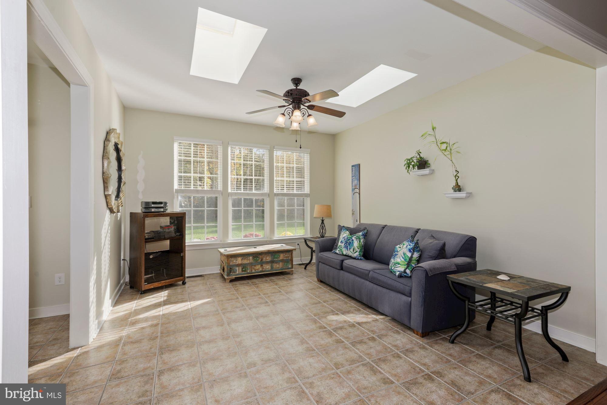 24776 Rivers Edge Road Millsboro, DE 19966 - Photo 26 of 53 Light and Airy Sunroom
