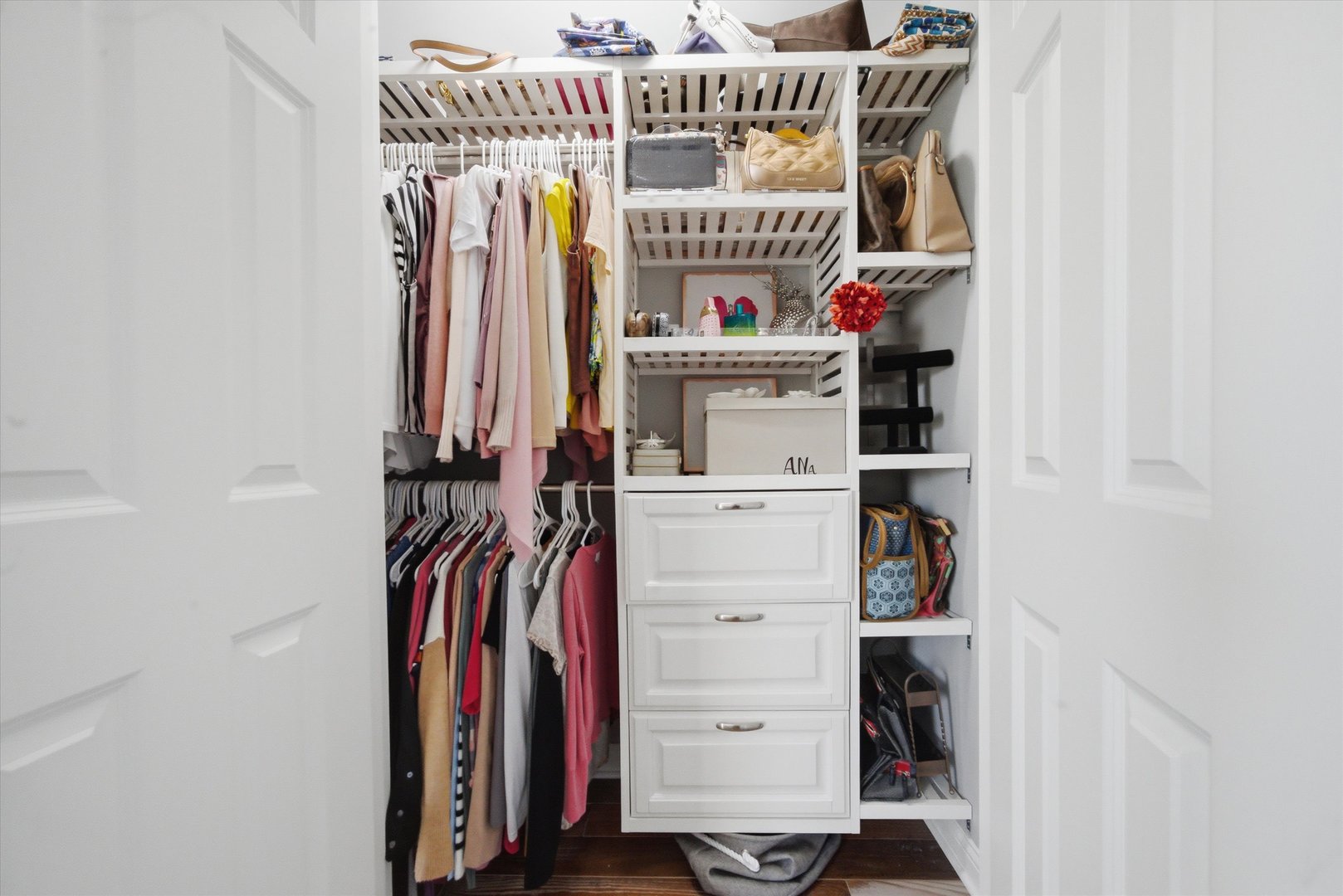 2448 Emily Lane Elgin, IL 60124 - Photo 17 of 34 a view of walk in closet with clothes and shoes