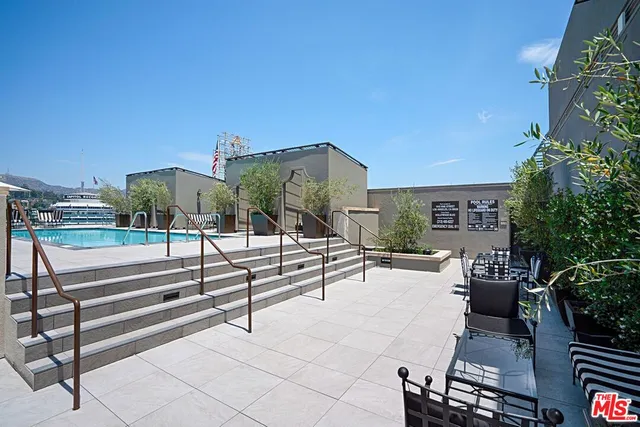 a view of a terrace with sitting area
