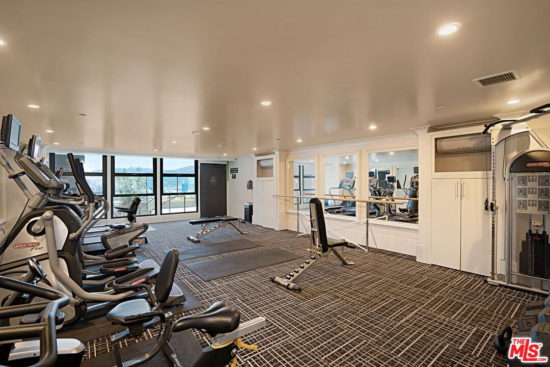 1645 Vine Street, Unit 703 Los Angeles, CA 90028 - Photo 34 of 44 a view of a room with gym equipment
