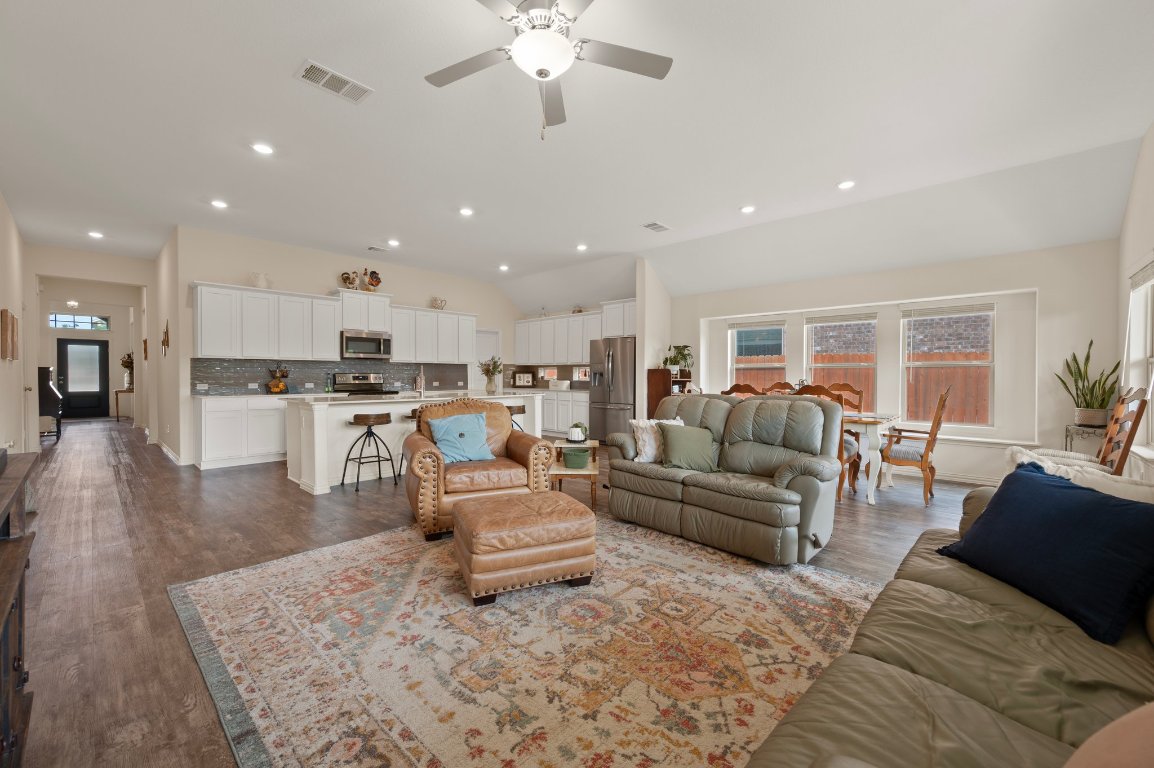 1437 Morning View Road Georgetown, TX 78628 - Photo 9 of 24 a living room with furniture and a view of kitchen
