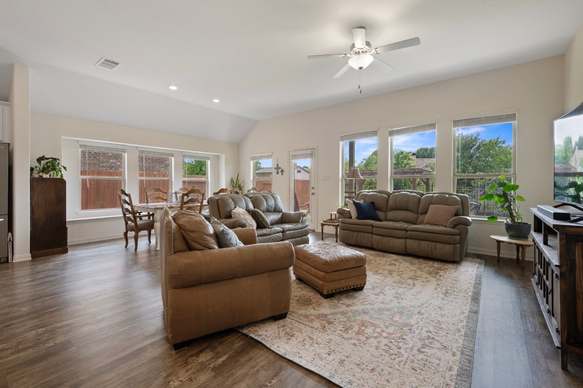 1437 Morning View Road Georgetown, TX 78628 - Photo 10 of 24 a living room with furniture wooden floor and a large window