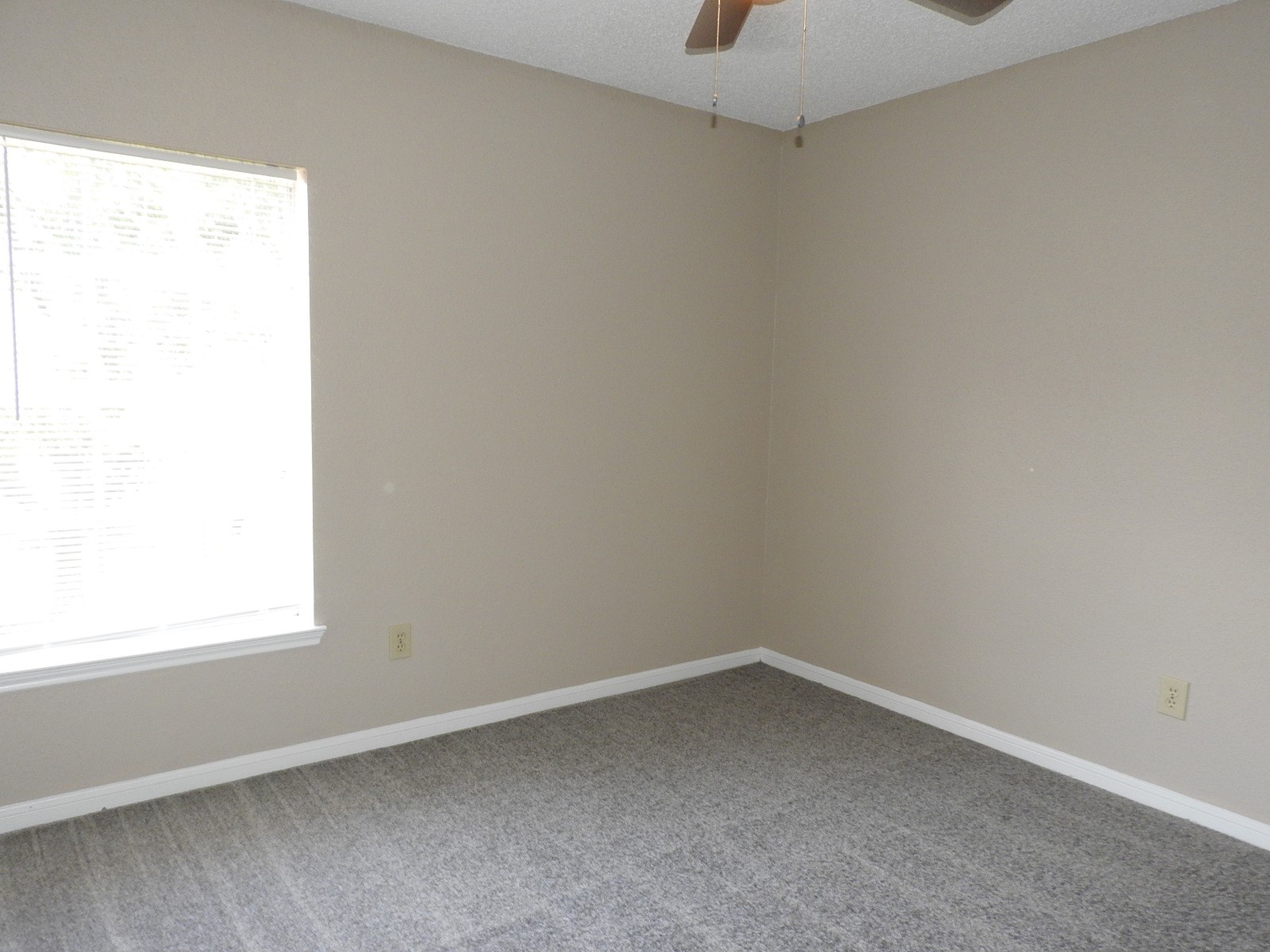 3107 Rimrock Drive Missouri City, TX 77459 - Photo 15 of 32 an empty room with a window