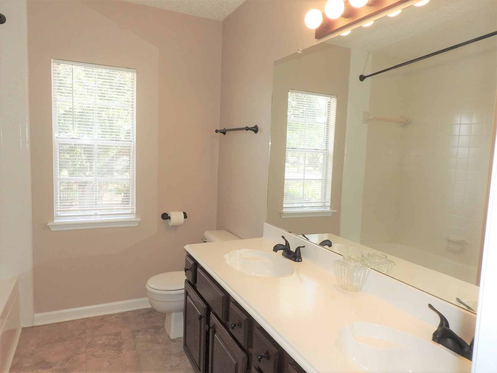3107 Rimrock Drive Missouri City, TX 77459 - Photo 19 of 32 a bathroom with a sink toilet and shower