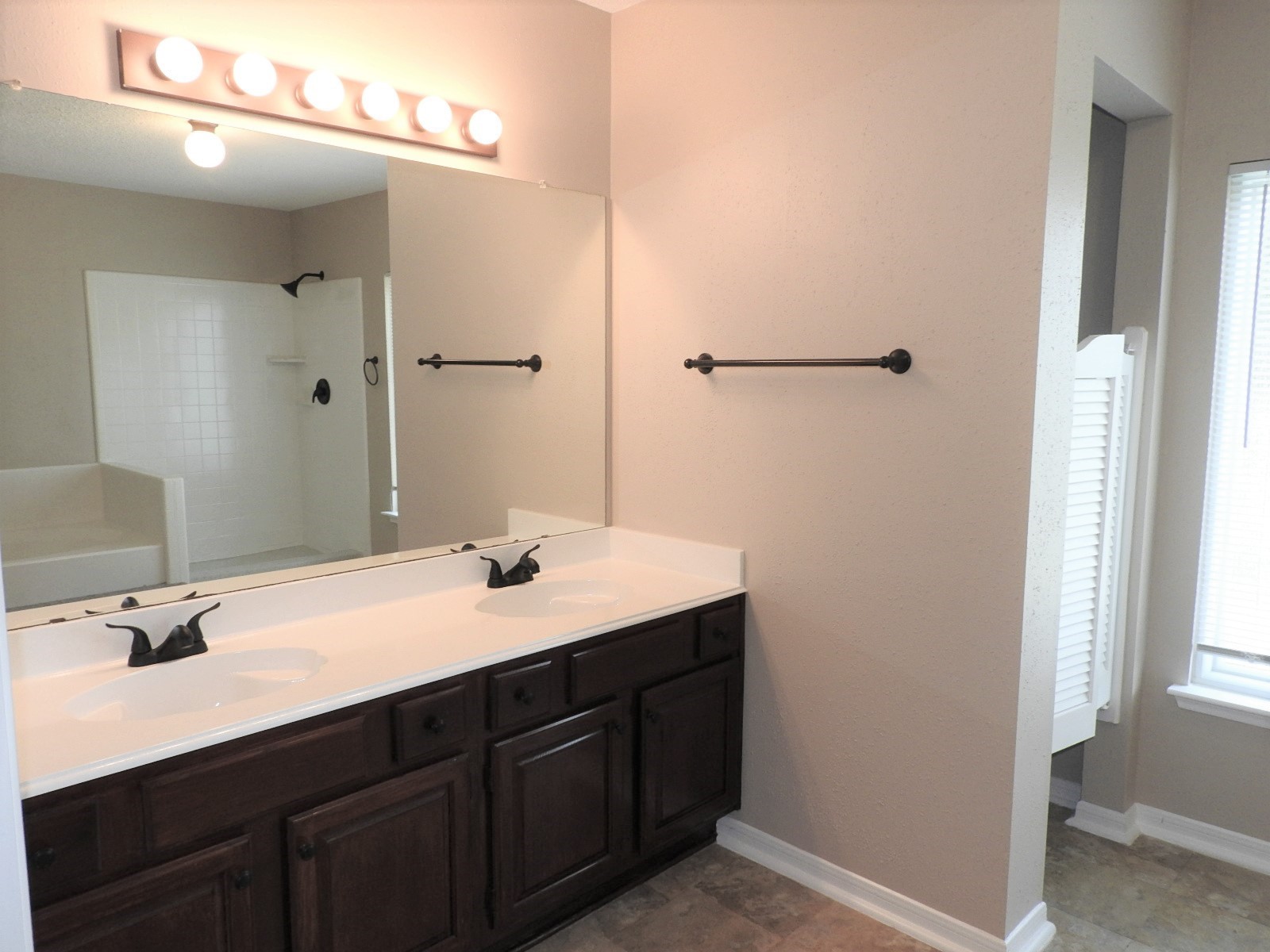 3107 Rimrock Drive Missouri City, TX 77459 - Photo 29 of 32 a bathroom with a sink and a mirror