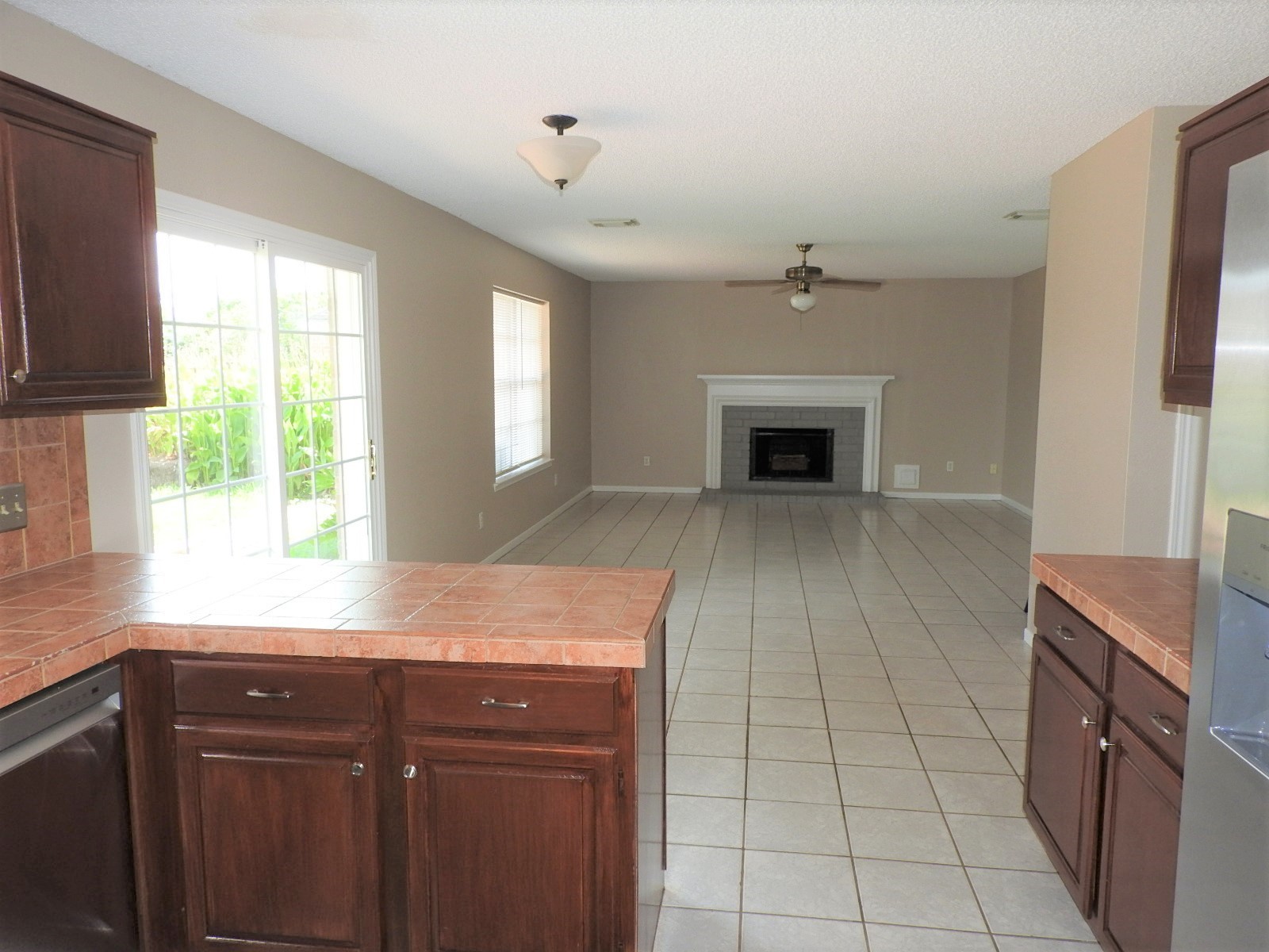 3107 Rimrock Drive Missouri City, TX 77459 - Photo 8 of 32 a kitchen with granite countertop a stove sink and cabinets